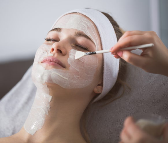 New Project (1) Women getting a facial treatment at a spa