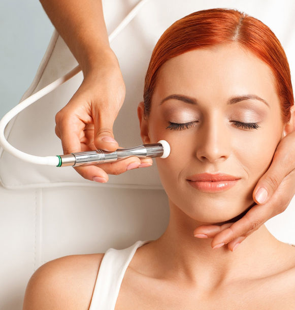 New Project-5 Woman receiving a microdermabrasion treatment